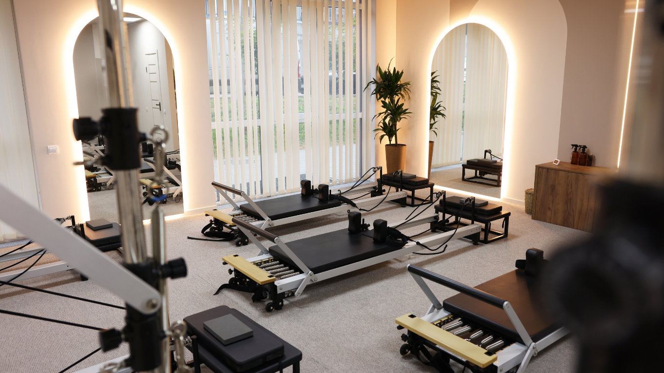 Reformer, Cadillac, and Wunda Chair equipment in the fully equipped Pilates studio at Center for Mind Body Balance